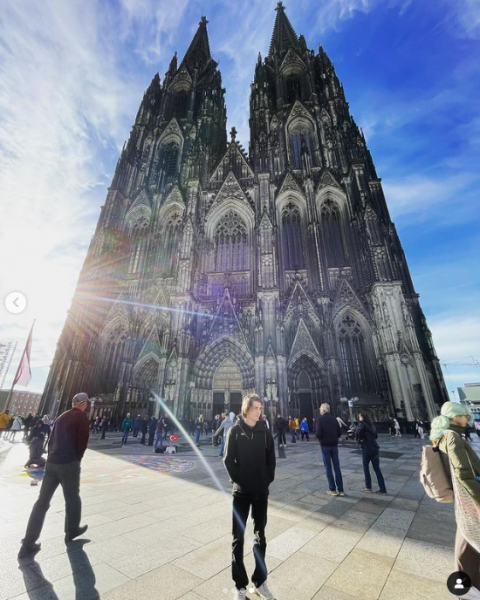 UNH student in front of a cathedral in Europe